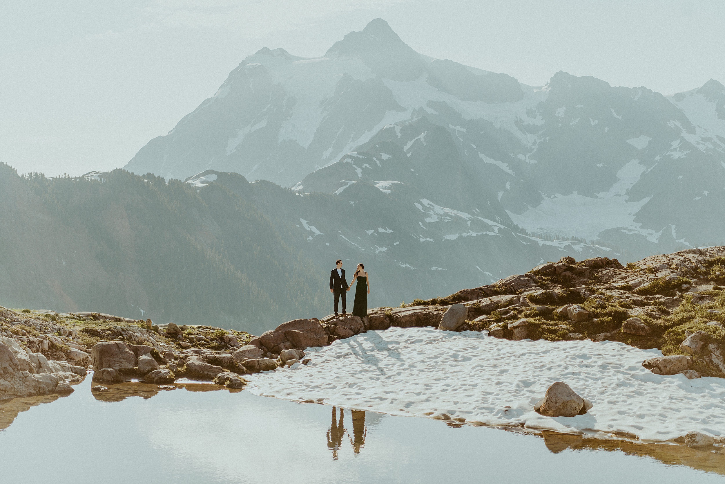 couple standing at mount baker lake
